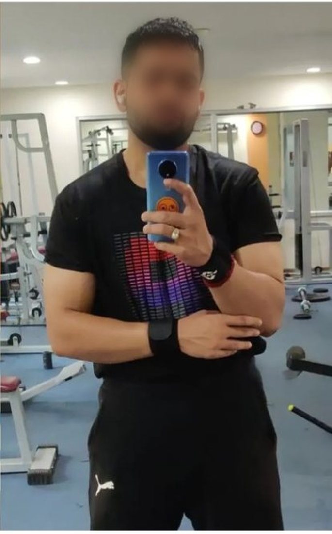 After photo from a client fitness transformation, face softly blurred for privacy